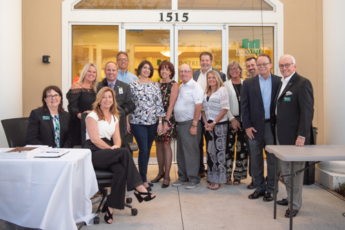 Team Mainstreet posing for a portrait during Clermont's 2nd Anniversary Celebration