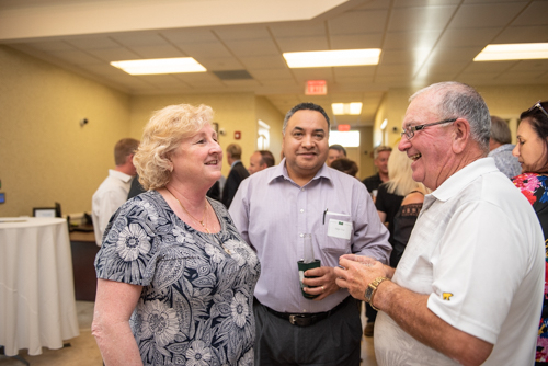 Guests chatting with members of Team Mainstreet during Clermont's 2nd Anniversary Celebration