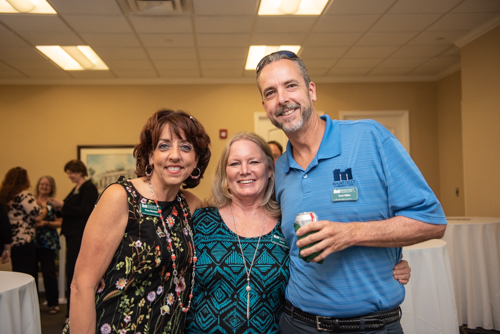 Team Mainstreet posing for a portrait during Clermont's 2nd Anniversary Celebration