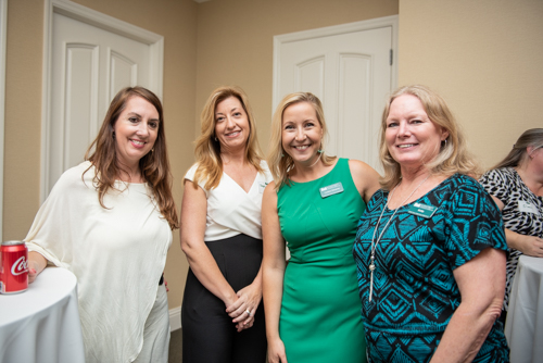 Team Mainstreet posing for a portrait during Clermont's 2nd Anniversary Celebration