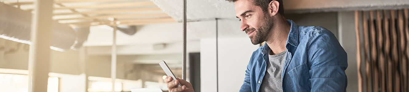 Man looking at his smartphone.