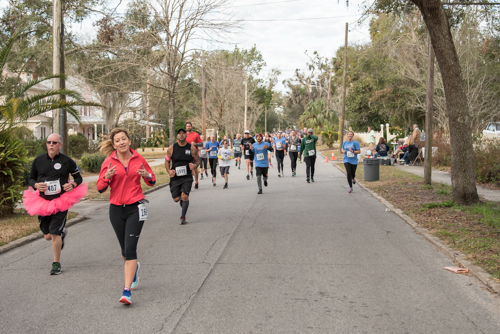 A member of Team Mainstreet running in the MeStrong 5k race in DeLand