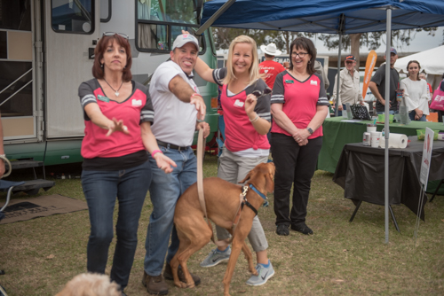 Team Mainstreet members goof and dance at Pig on the Pond event