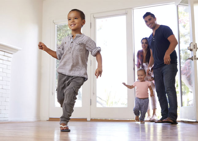 Family entering their new home.