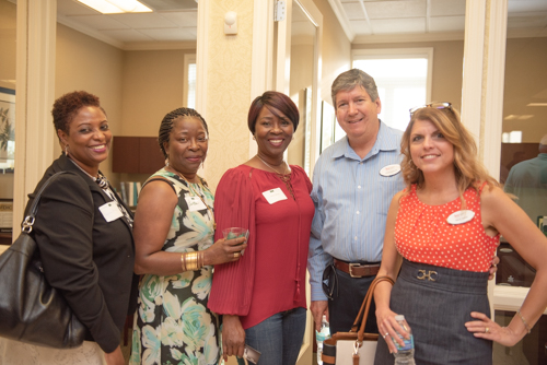 Community members posing for a picture while enjoying Clermont's 2nd Anniversary Celebration