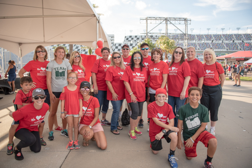 Group portrait of Team Mainstreet during the 2018 Heart Walk at Daytona International Speedway