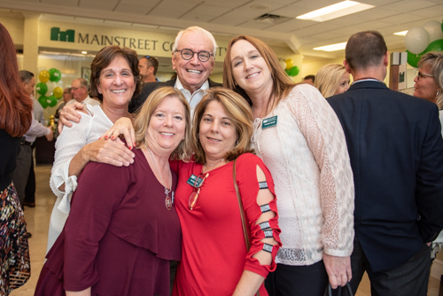 Team Mainstreet posing for a portrait during Clermont's 2nd Anniversary Celebration