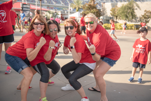 Team Mainstreet flexing their muscles for a picture at the Heart Walk