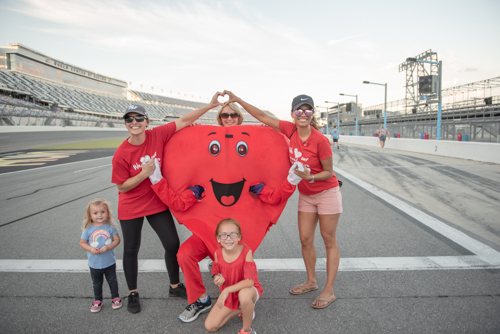 Team Mainstreet with the Heart Walk Mascot at Daytona International Speedway