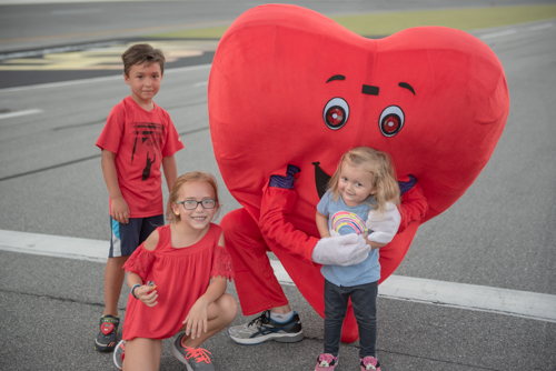 Team Mainstreet with the Heart Walk Mascot at Daytona International Speedway