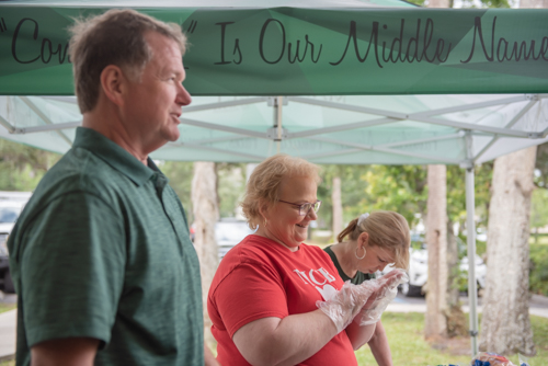 Two employees chatting and preparing for lunch at Customer Appreciation Day in DeLand