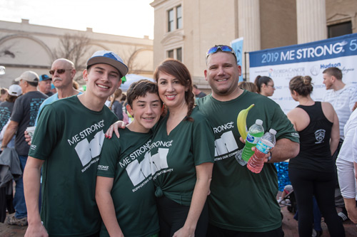 Family poses for portrait after MeStrong race