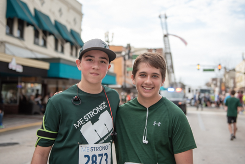 Two young men on Woodland blvd after MeStrong race