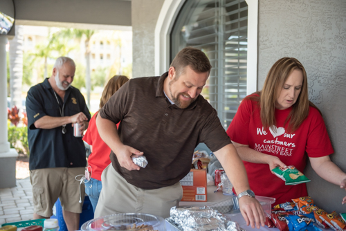 Customers and employees make their lunches at Customer Appreciation Day in Holly Hill