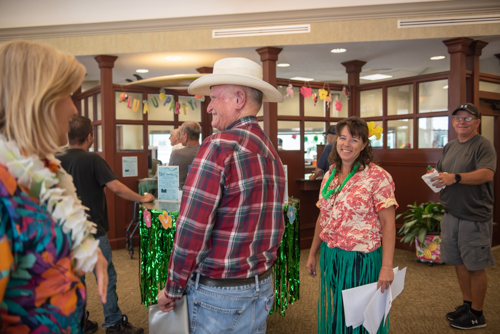 Customers and team members smile inside North Spring Garden Branch in DeLand