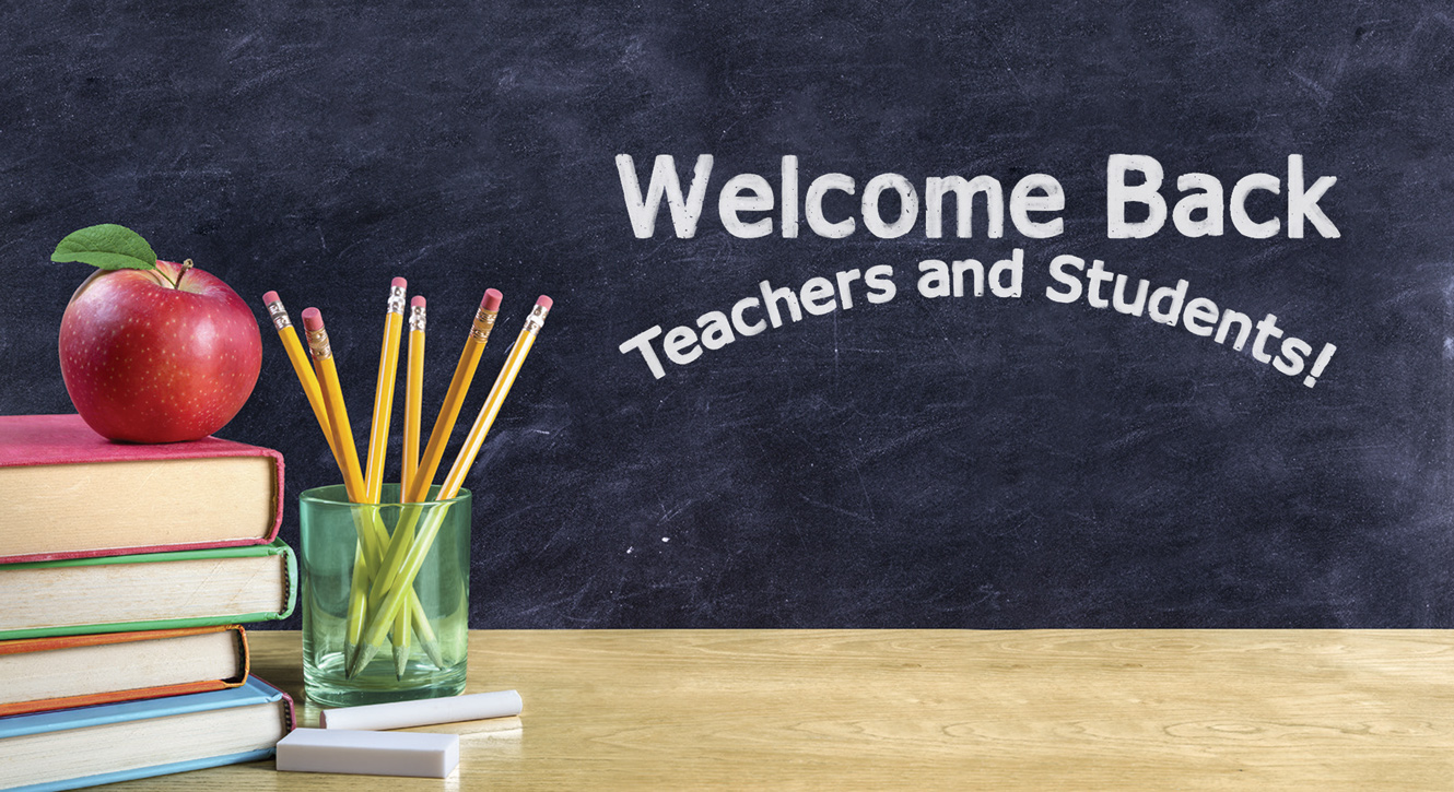 Apple on books with pencils in cup against blackboard background. Words reading welcome back teachers and students
