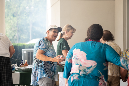 Customer smiles at team member during Mainstreet's Customer Appreciation Day