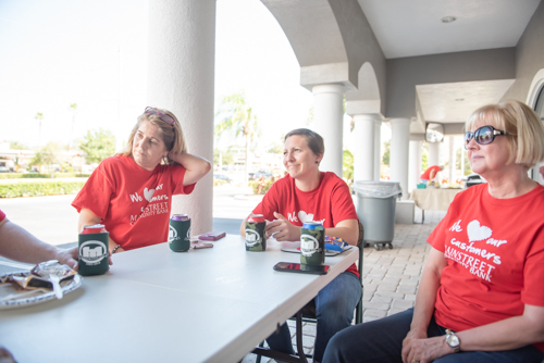 East Volusia team members sit and eat during customer appreciation day