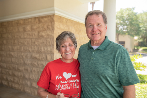 Two Mainstreet Community Bank employees smile for a photo at Customer Appreciation Day.