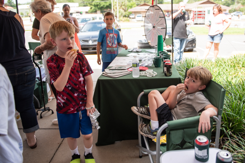 Children enjoy hot dogs and drinks during Orange City Customer Appreciation Day in Orange City branch