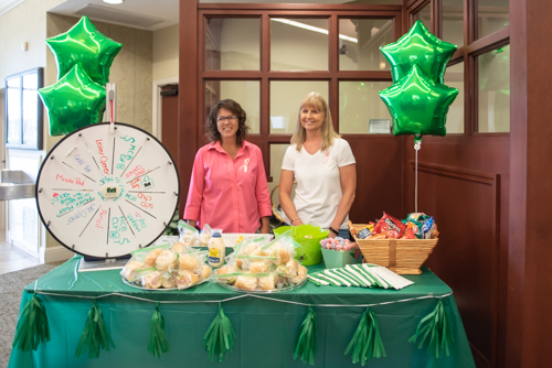 Two women smile for a portrait during Customer Appreciation Day at Mainstreet Community Bank