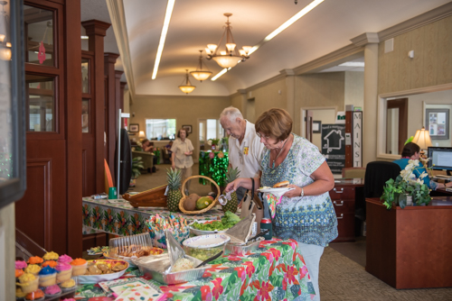 Customers get food inside the North Spring Garden Mainstreet Community Bank branch during Customer Appreciation