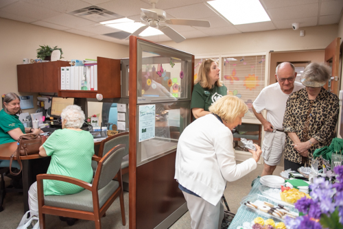 Customers and employees chat during John Knox Village Customer Appreciation at Mainstreet Community Bank