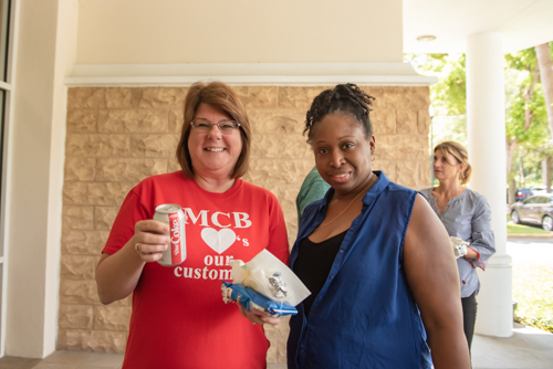 Two team members have lunch at Mainstreet Community Bank Customer Appreciation Day