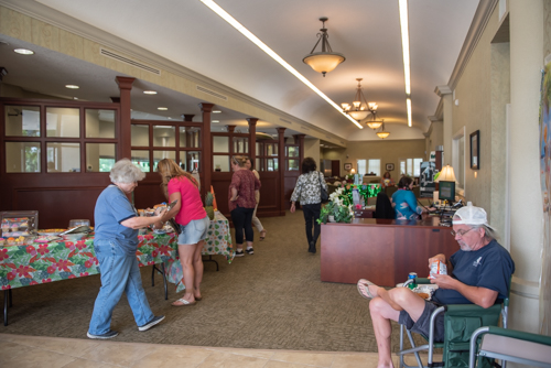 Customers eat and chat during Customer Appreciation Day in North Spring Garden branch of Mainstreet Community Bank