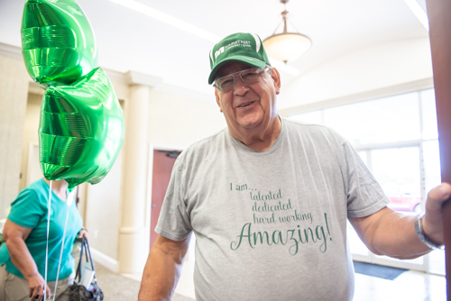 Man smiling wearing Mainstreet Community Bank hat in North Spring Garden branch